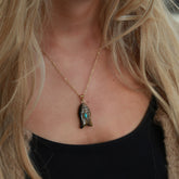 Collier amulette poisson